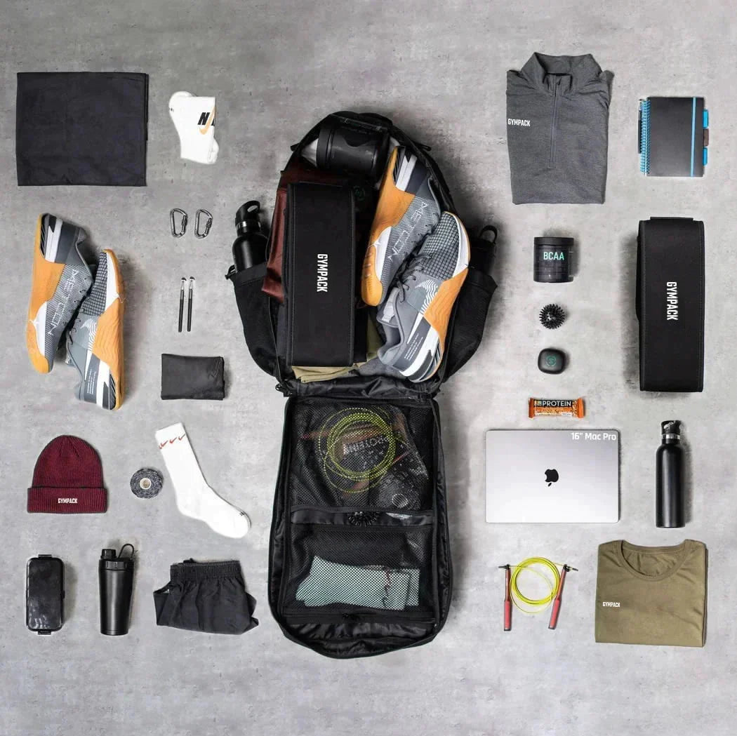 Mochila Gympack Pro 50L Branca - Vista Superior com Compartimentos Abertos e Itens Organizados